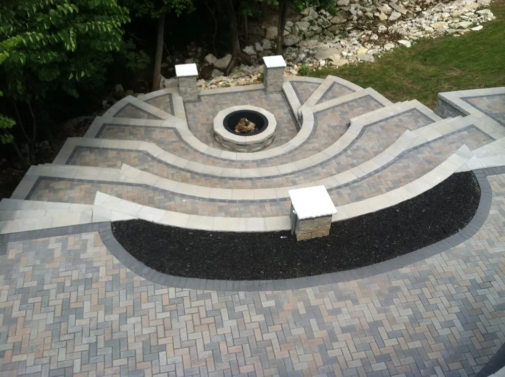 Professional yard maintenance with custom design in St. Louis, MO by Agape Retaining Walls