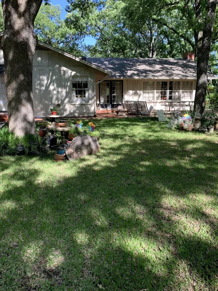 Custom garden landscaping for residential properties in Sulphur Springs, TX by Agape Services