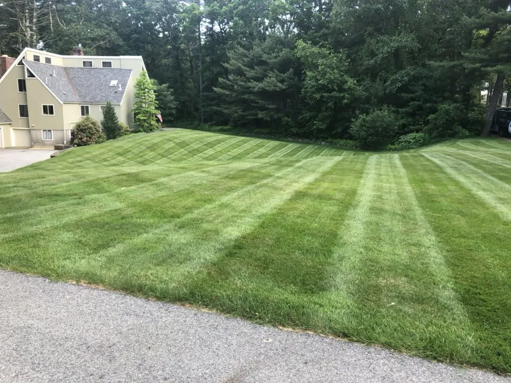 Expert lawn mowing service with custom design in Beverly, MA by Aggy's Landscaping