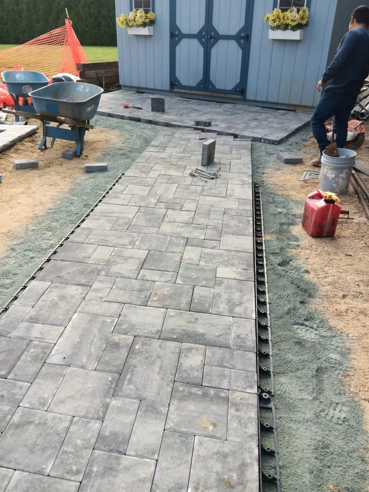 Professional landscape installation for residential properties in Milford, DE by Aguilar Lawncare