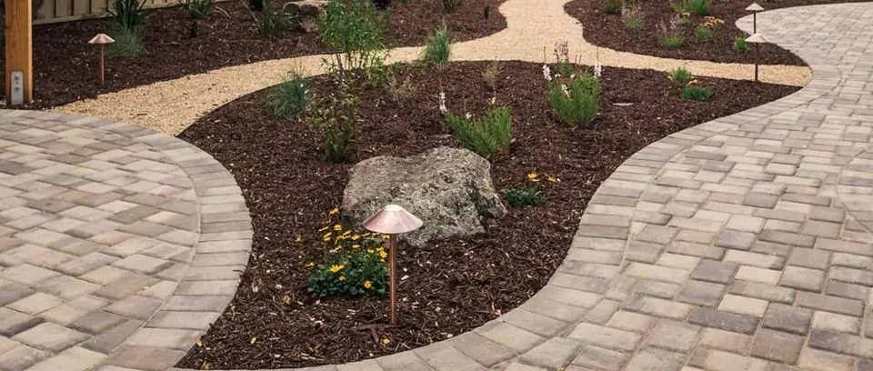 Custom yard cleanup service for year-round maintenance in Kennett Square, PA by Aguilera Landscaping & Masonry