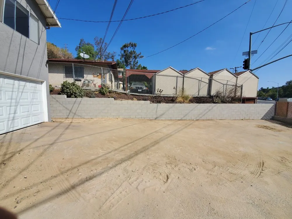 Local lawn mowing service with custom design in San Diego, CA by Agui's Concrete