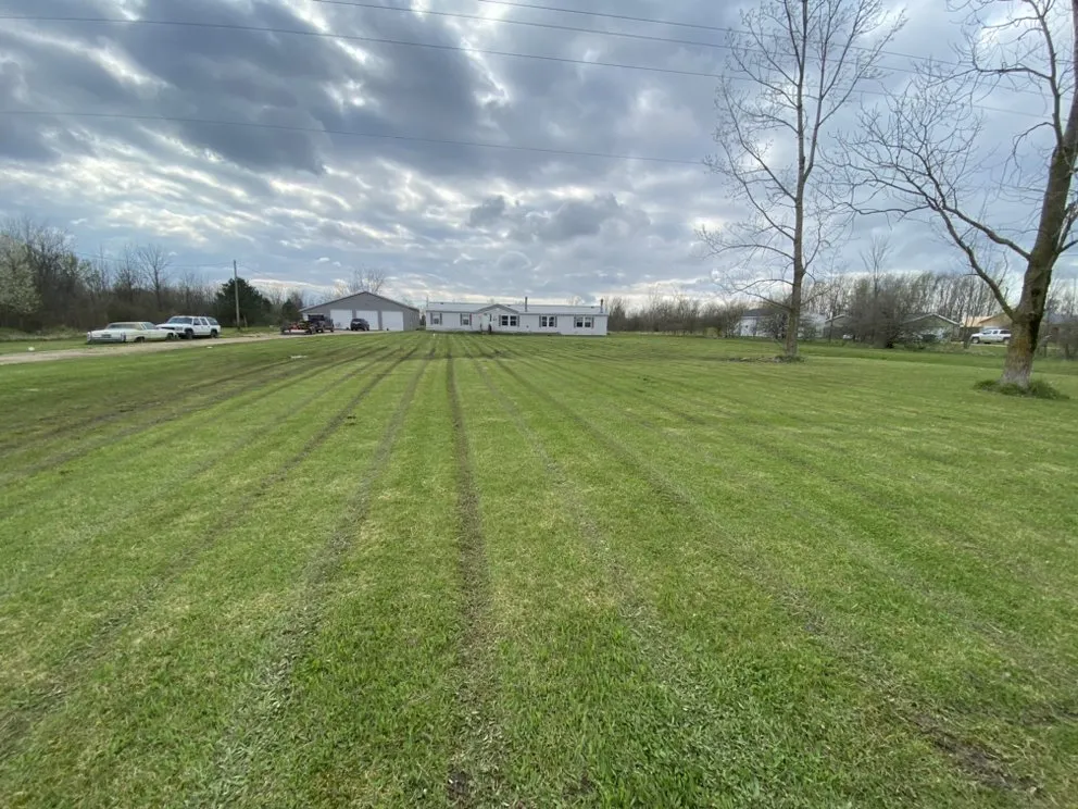 Affordable yard cleanup service for outdoor upgrades across Allegan, MI - Agustin’s Lawn Care