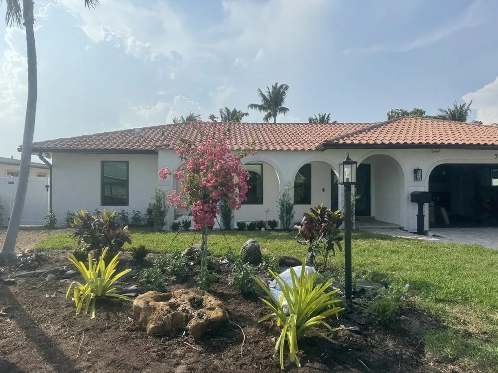 Professional lawn mowing service with custom design in Lake Worth Beach, FL by A&H Landscaping & Maintenance