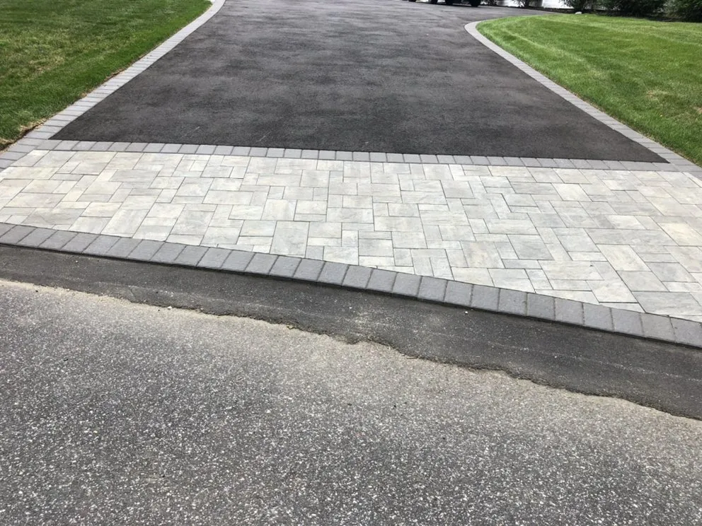 Custom landscape installation with custom design in Commack, NY by AI Landscaping