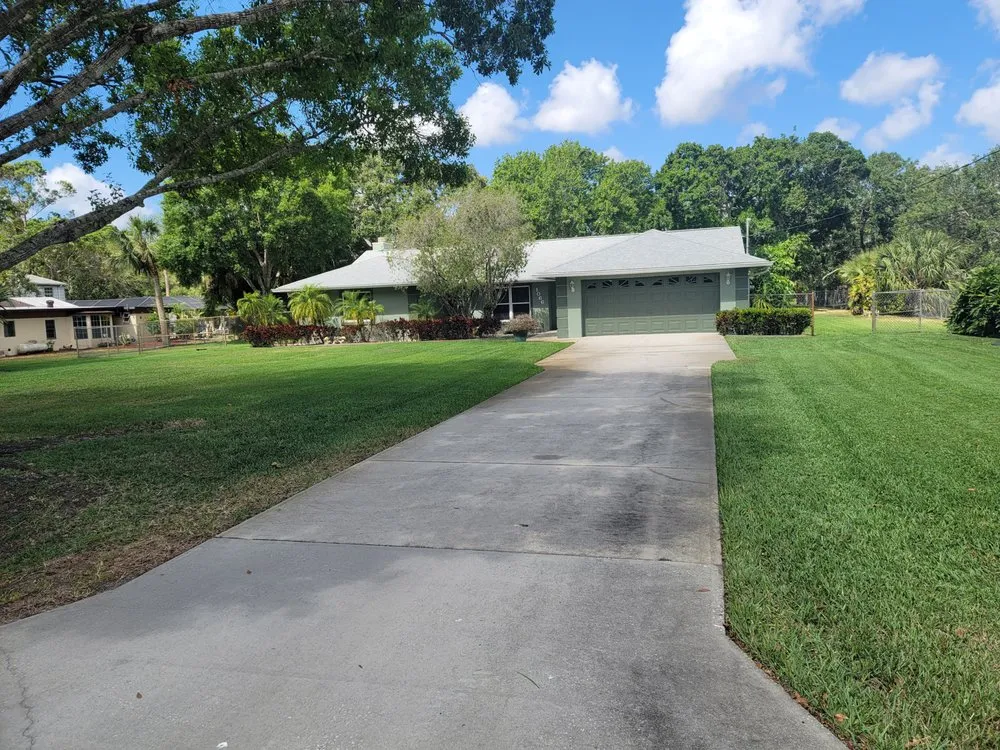 Trusted landscaping services experts serving Palm Bay, FL - Aim High Lawn & Landscape