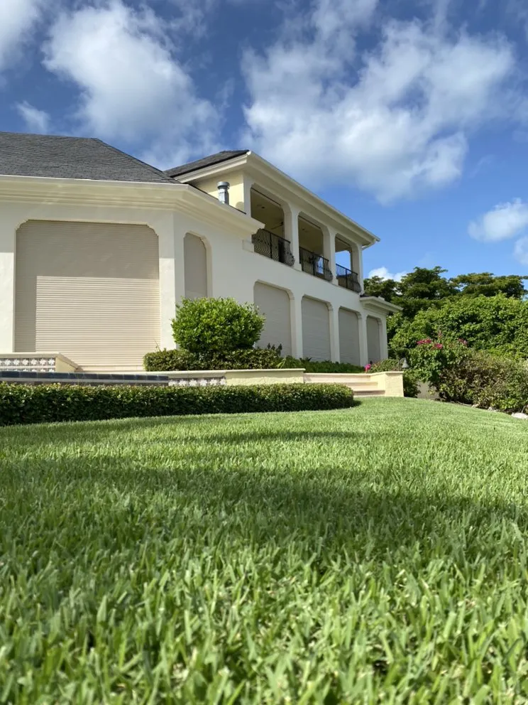 Custom landscape installation in Naples, FL by Aim's Lawn Care