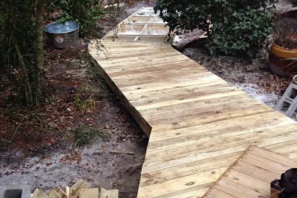 Custom landscape installation for outdoor upgrades in Freeport, FL by Aitken's Lawn Maintenance