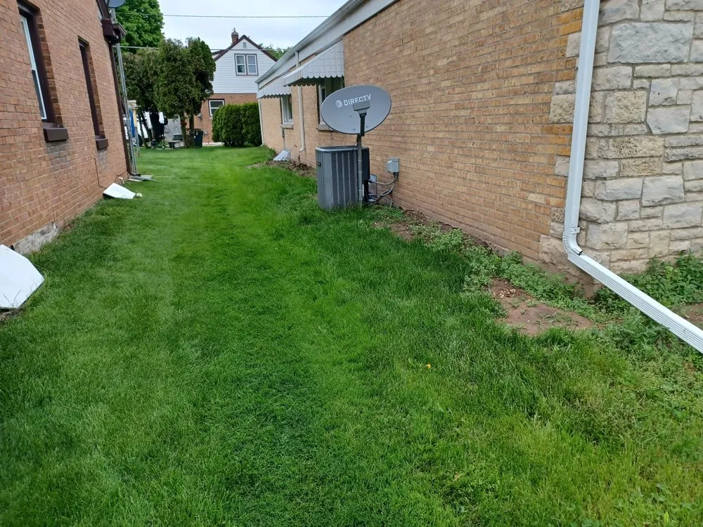 Local lawn mowing service with custom design in Manitowoc, WI by A.J- Ingersoll services
