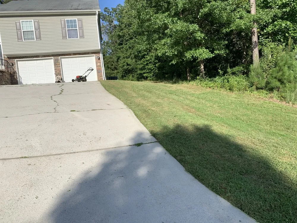 Affordable landscape design with custom design in Conyers, GA by A&J Clean Cut Lawn Care