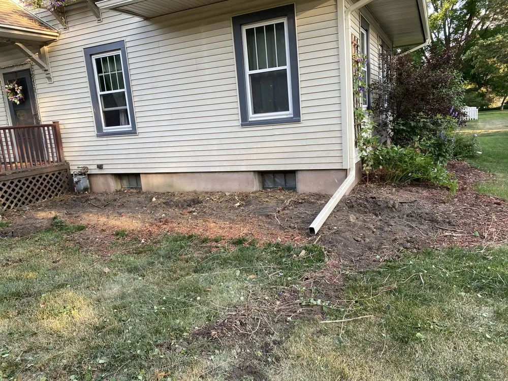 Professional yard cleanup service for homes in Elkhorn, WI by AJ Outdoor Services