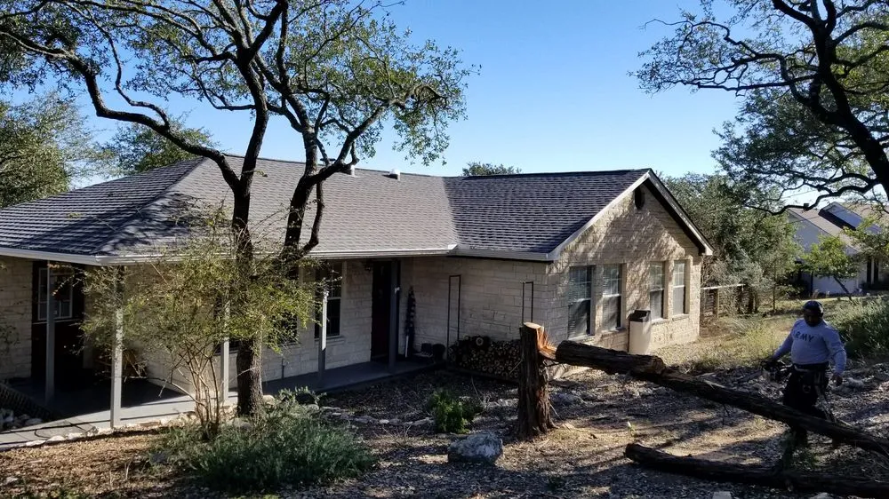 Custom landscape installation for year-round maintenance in Kyle, TX by AJ Tree Services