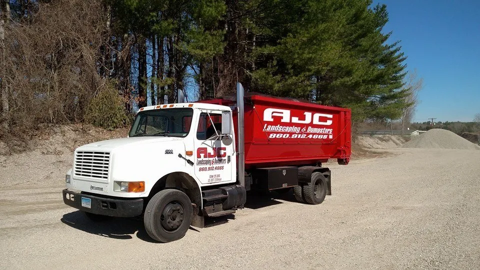 Professional lawn care service with custom design across Oakdale, CT - AJC Landscaping & Dumpsters