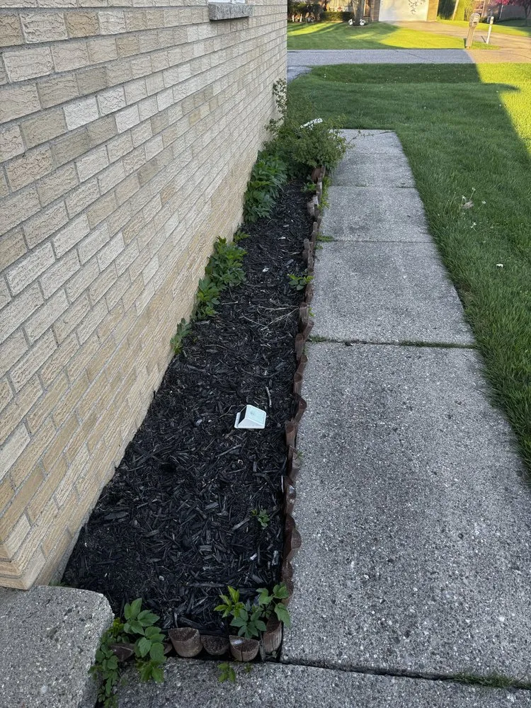 Local lawn mowing service for residential properties in Troy, MI by AJC Landscaping