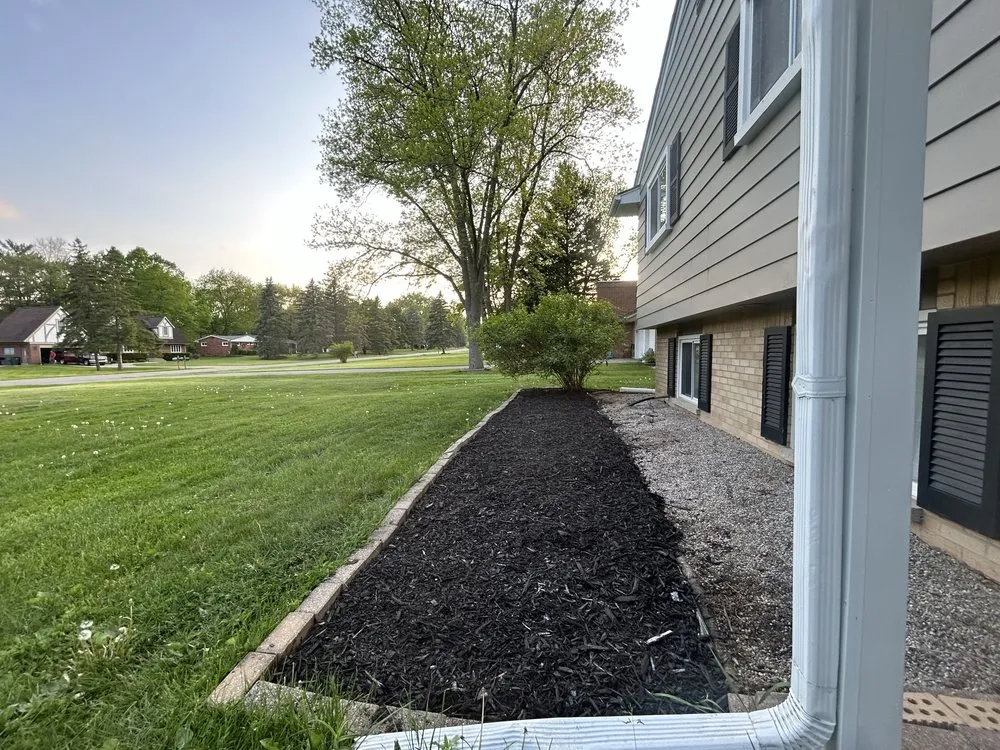Custom landscape installation with custom design across Troy, MI - AJC Landscaping