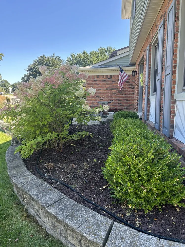 Custom lawn care service for residential properties across Troy, MI - AJC Landscaping