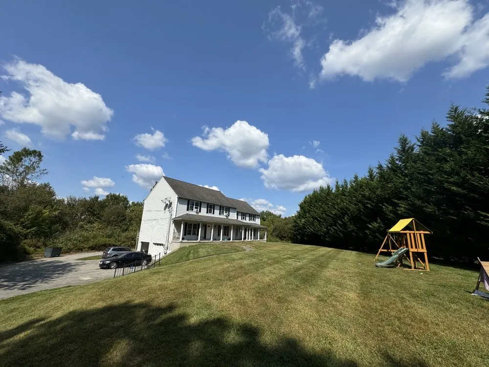 Top-rated residential landscaping with custom design in Swansea, MA by AJI Lawn & Tree