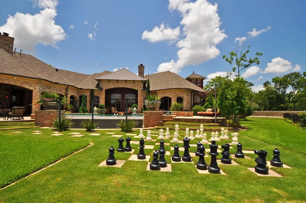 Custom lawn mowing service for outdoor upgrades across Houston, TX - AJ's Landscaping & Design, Inc