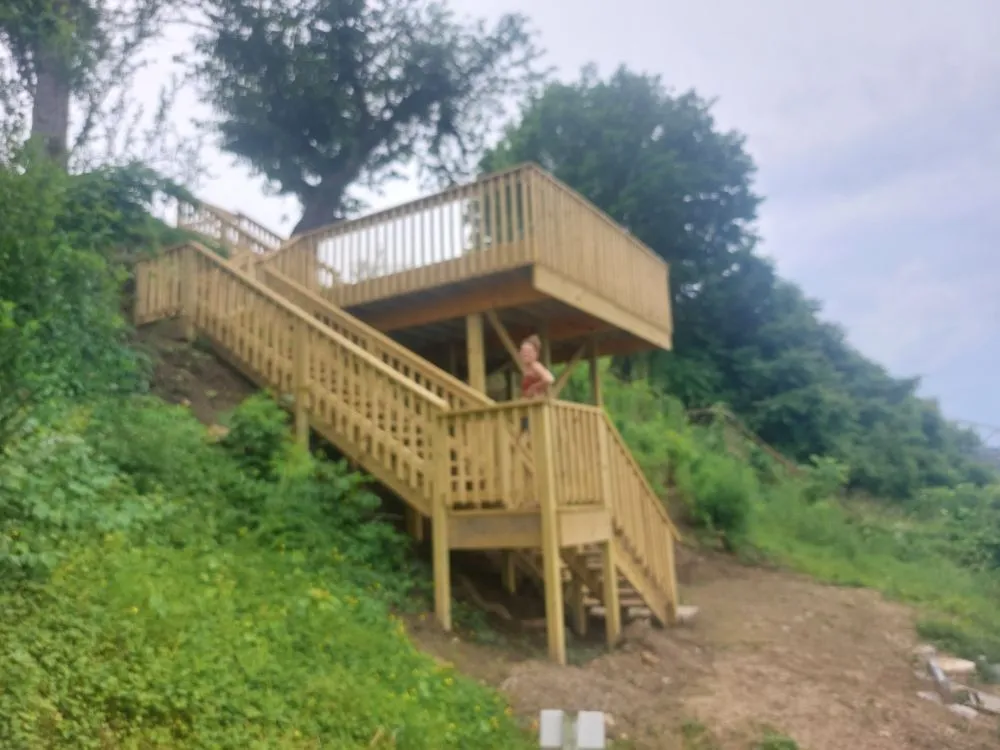 Expert lawn mowing service with custom design across Charleston, WV - AK Construction