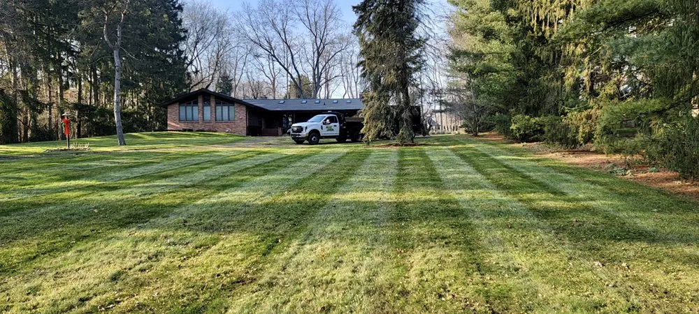 Custom lawn mowing service for residential properties across Milan, MI - AK Lawn Care