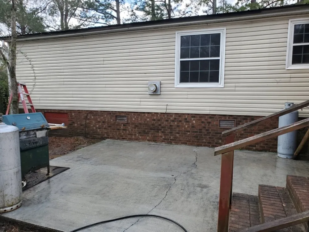 Professional yard maintenance in Four Oaks, NC by AK Pressure Washing Services and Landscaping