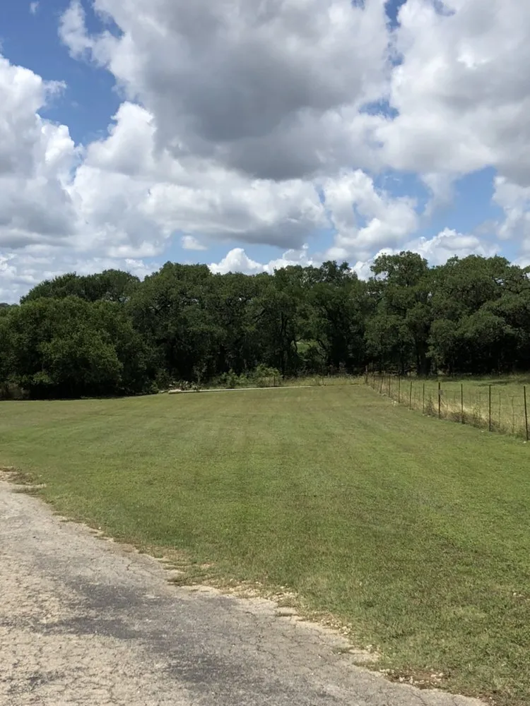 Professional lawn mowing service in Schertz, TX by AK&H First Response Lawn Care and More