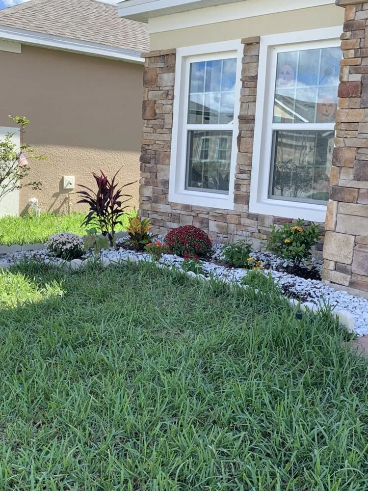 Custom outdoor landscaping for year-round maintenance in Kissimmee, FL by Al Cortez Lawn & Landscaping Services
