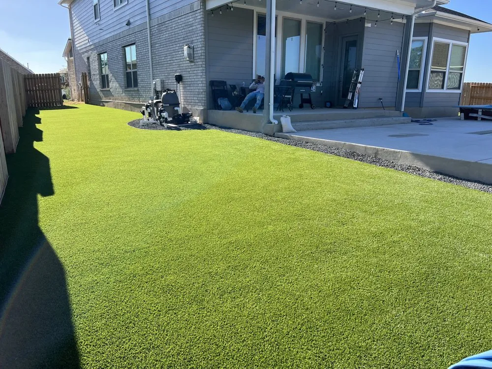 Professional landscape installation with custom design in San Antonio, TX by Alamo City Tree Service & Landscaping