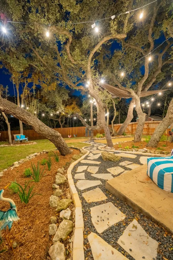 Trusted lawn mowing service with custom design in San Antonio, TX by Alamo City Tree Service & Landscaping