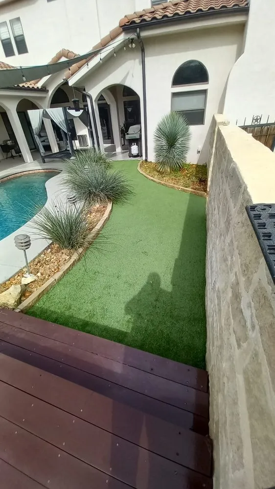 Professional yard cleanup service with custom design in San Antonio, TX by Alamo Outdoor Solutions