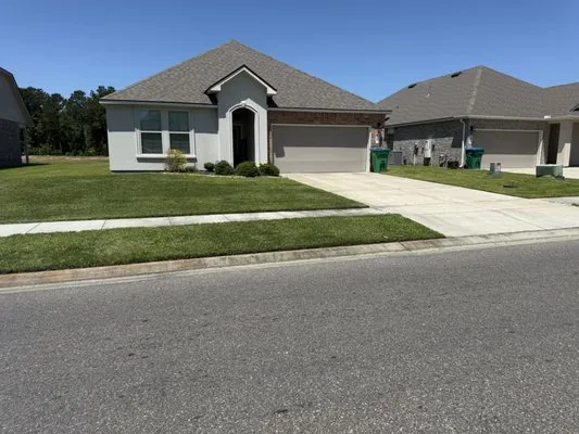 Alan’s Lawn Care Logo