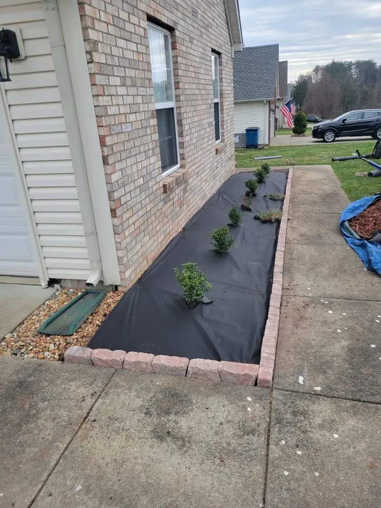 Professional outdoor landscaping for residential properties in Louisville, KY by Alberto Alavez Professional Lawn Services
