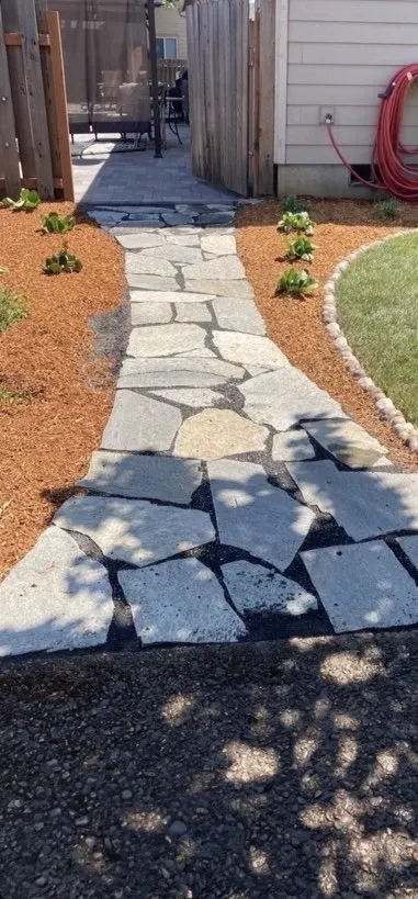 Custom landscape installation for residential properties in Hubbard, OR by Albizo Landscaping