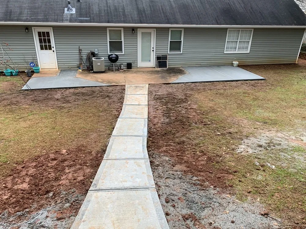 Custom yard cleanup service for outdoor upgrades in North Augusta, SC by Alcon Concrete & Landscaping