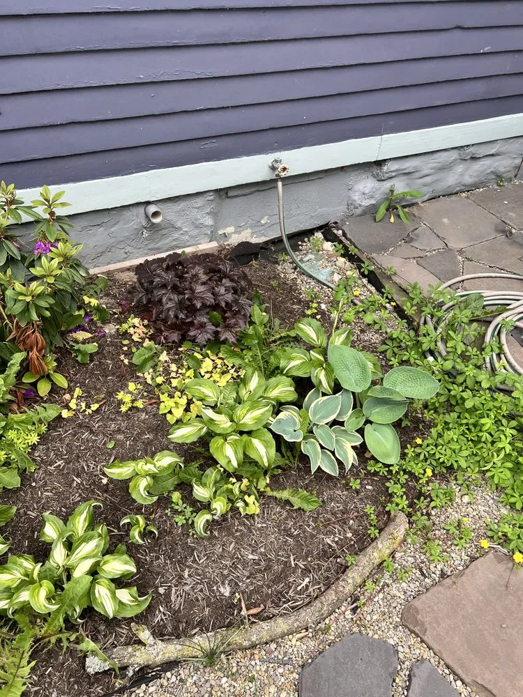 Custom yard cleanup service in Niagara Falls, NY by Alder-Conn Landscaping