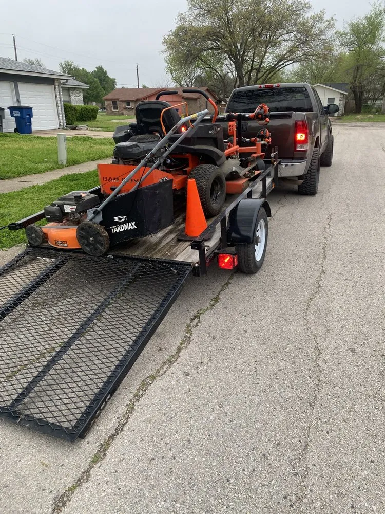 Affordable landscape installation experts serving Lancaster, TX - Alex mowing