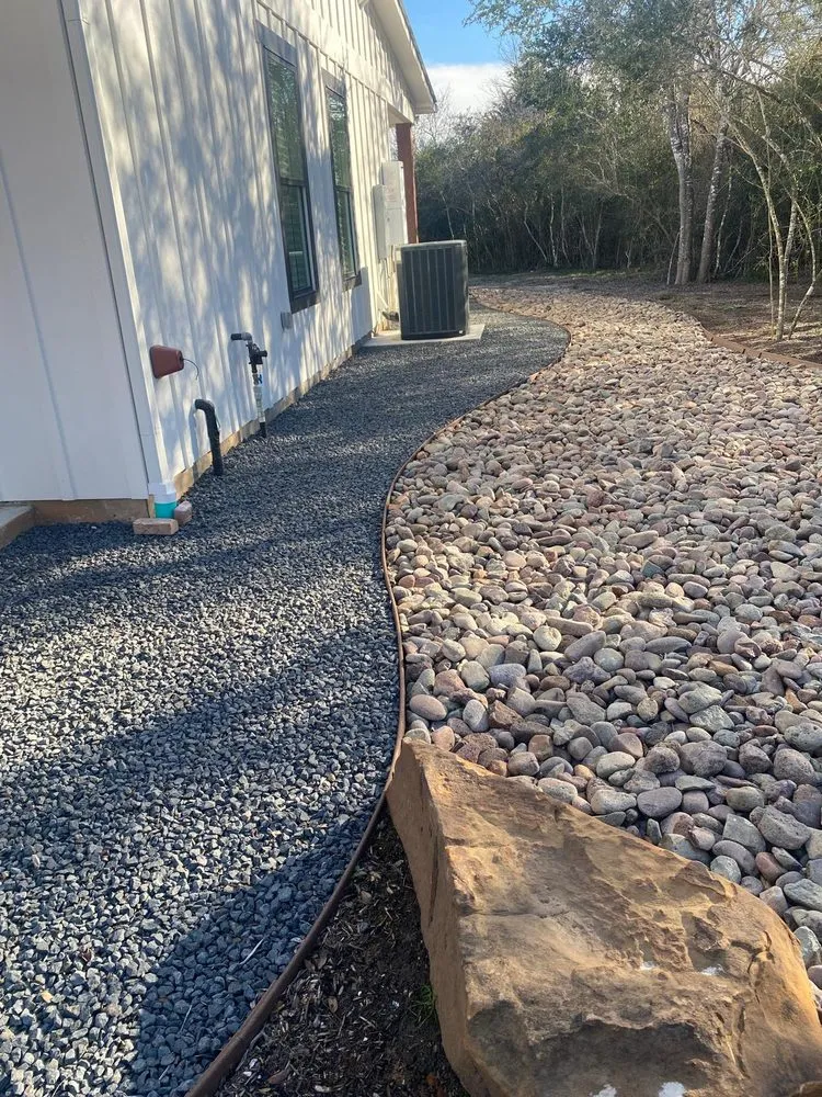 Custom landscape design for beautiful yards in Bellville, TX by Alex Services