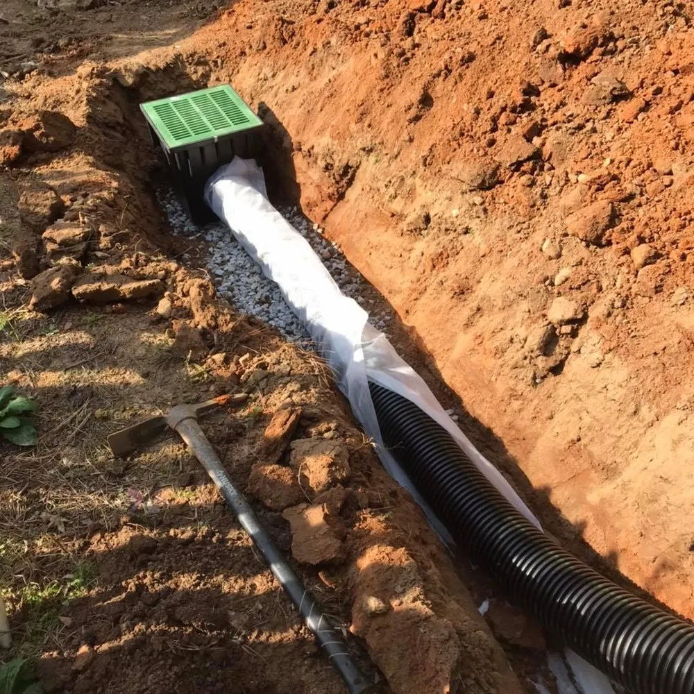 Custom landscape installation for year-round maintenance in Anniston, AL by Alexander Landscaping