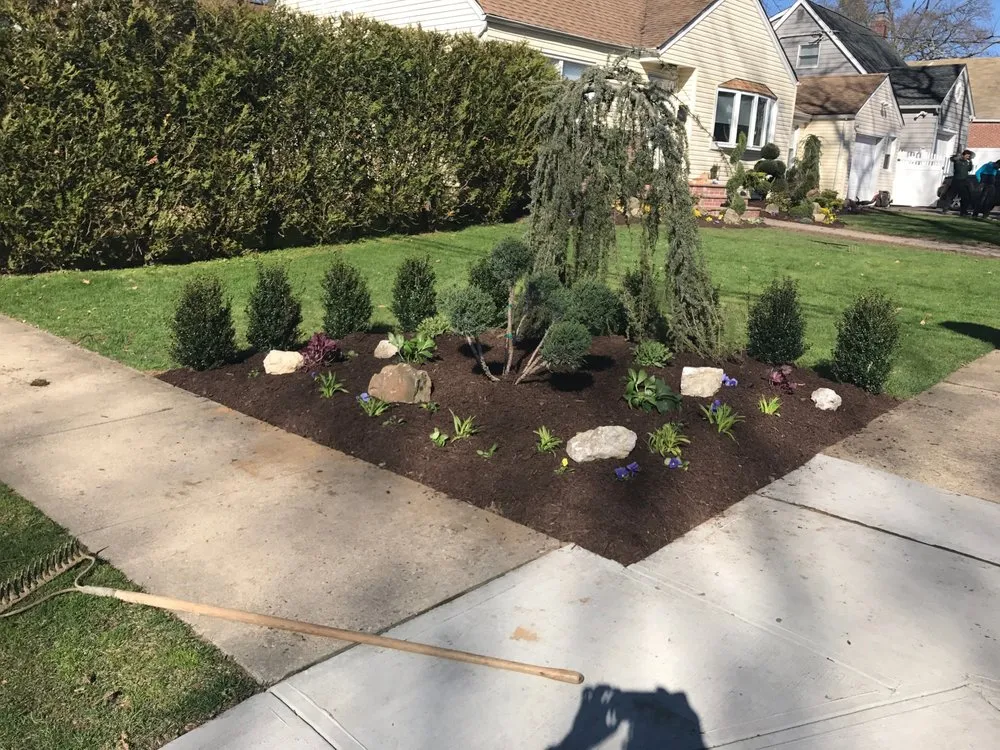 Affordable yard cleanup service for year-round maintenance in Rosedale, NY by Alexander Landscaping
