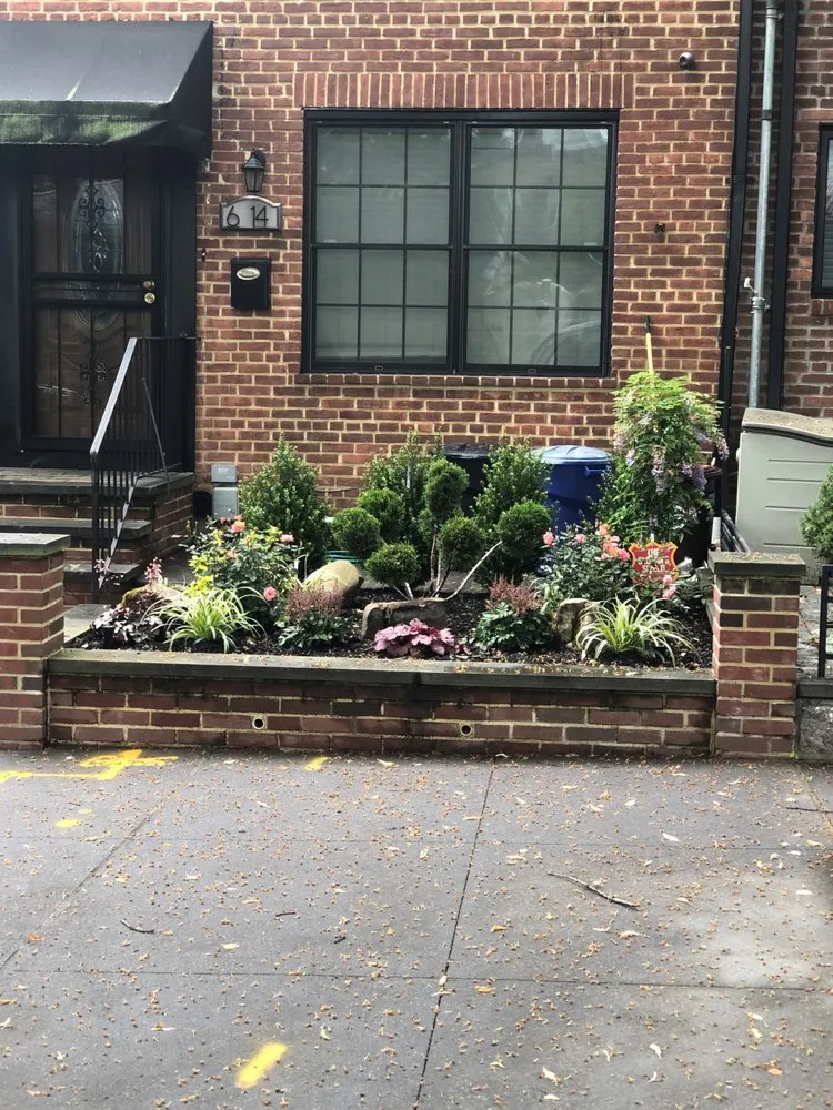 Expert lawn mowing service with custom design in Rosedale, NY by Alexander Landscaping