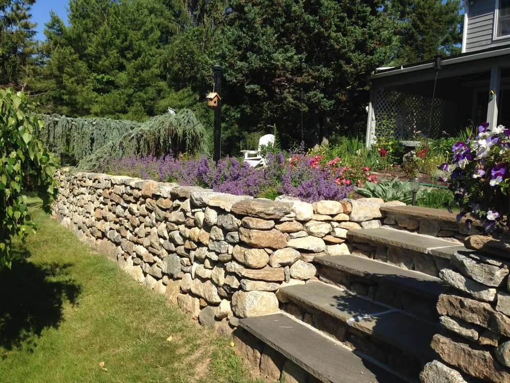 Professional yard maintenance for year-round maintenance in Guilford, CT by Alexandra's Gardens