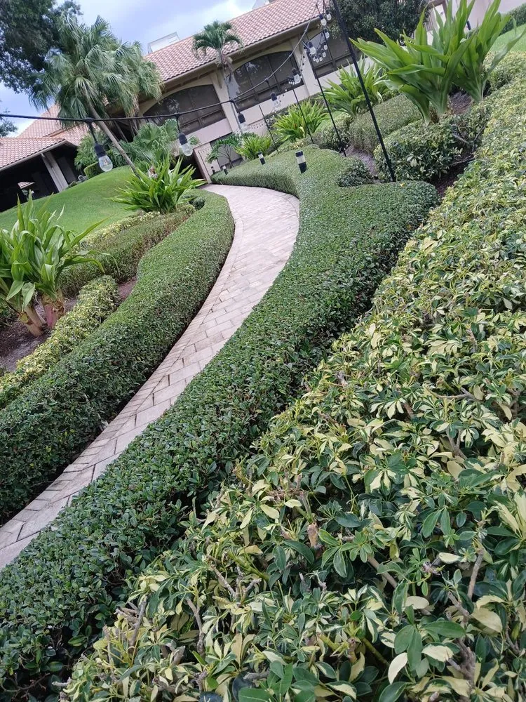 Local lawn mowing service with custom design across Lake Worth Beach, FL - ALG Landscaping