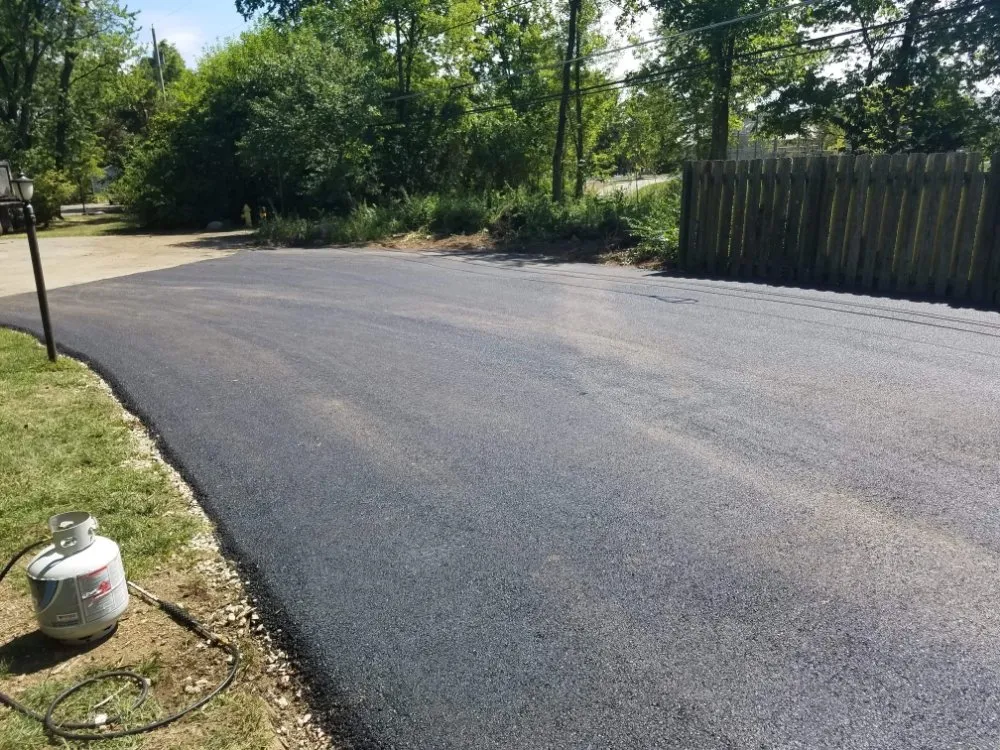 Affordable yard cleanup service for residential properties across Columbus, OH - All About Asphalt & Concrete