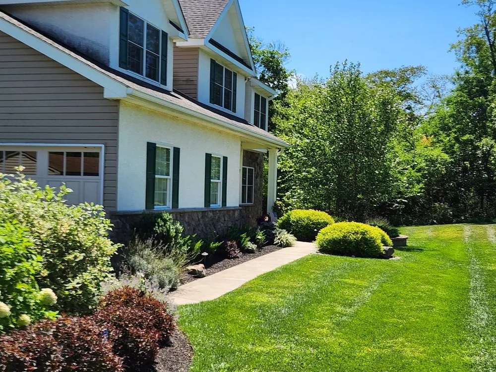 Custom landscaping services for residential properties in New Britain, PA by All About You Patio & Landscapes