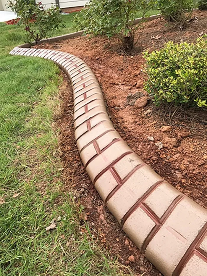 Professional yard maintenance in St. Augustine, FL by All American Curbing