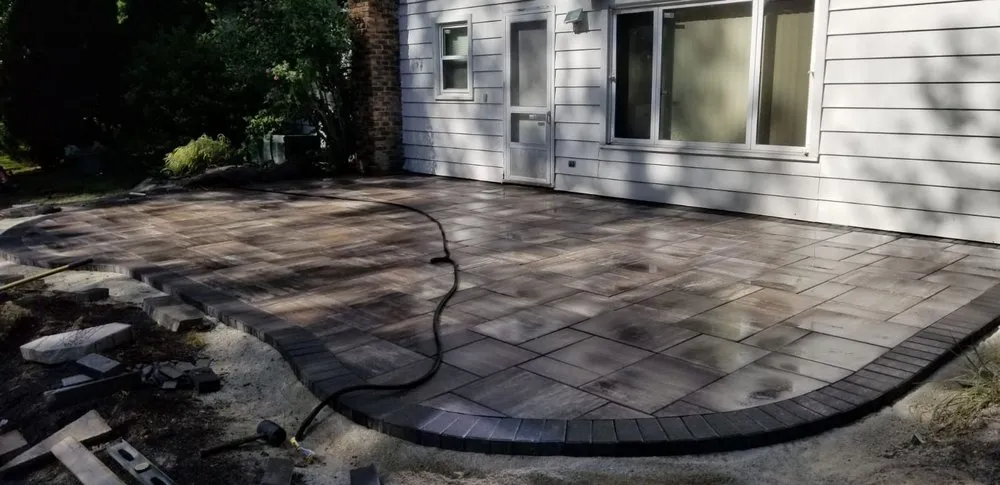 Expert yard cleanup service for outdoor upgrades in Round Lake Park, IL by All American Hardscape And Landscape