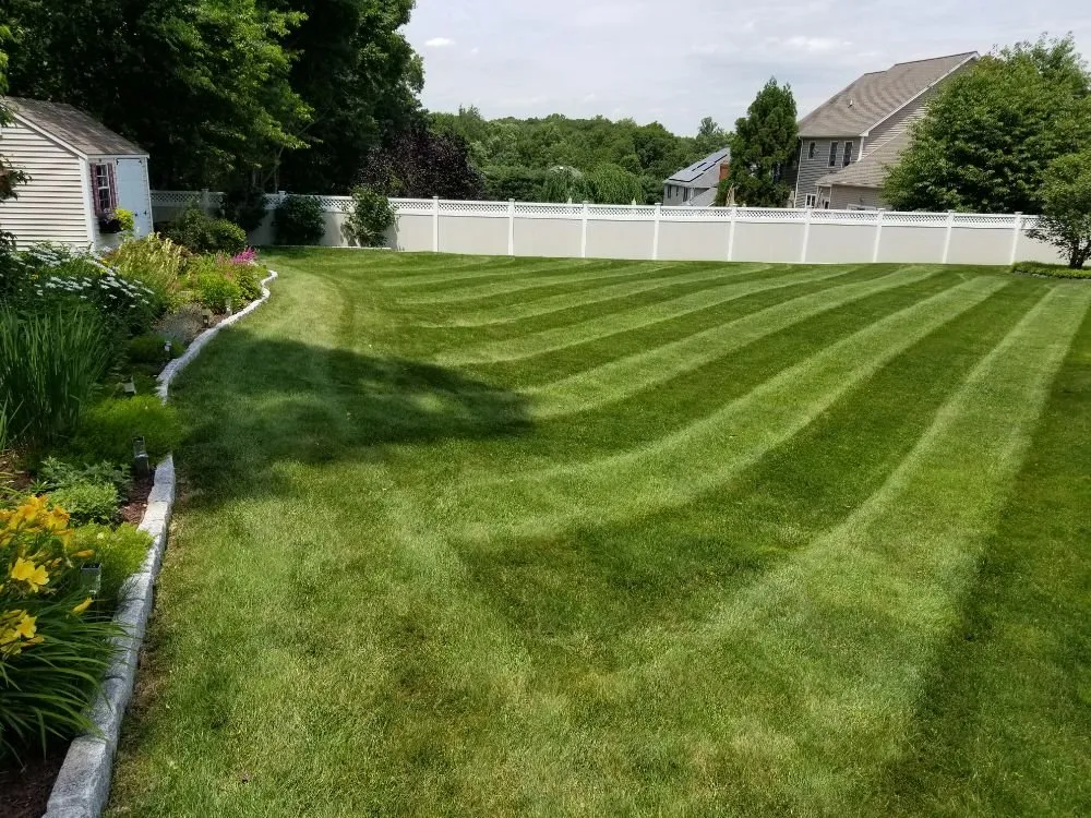 Expert lawn mowing service for beautiful yards in Monroe, CT by All American Land and Lawn Care