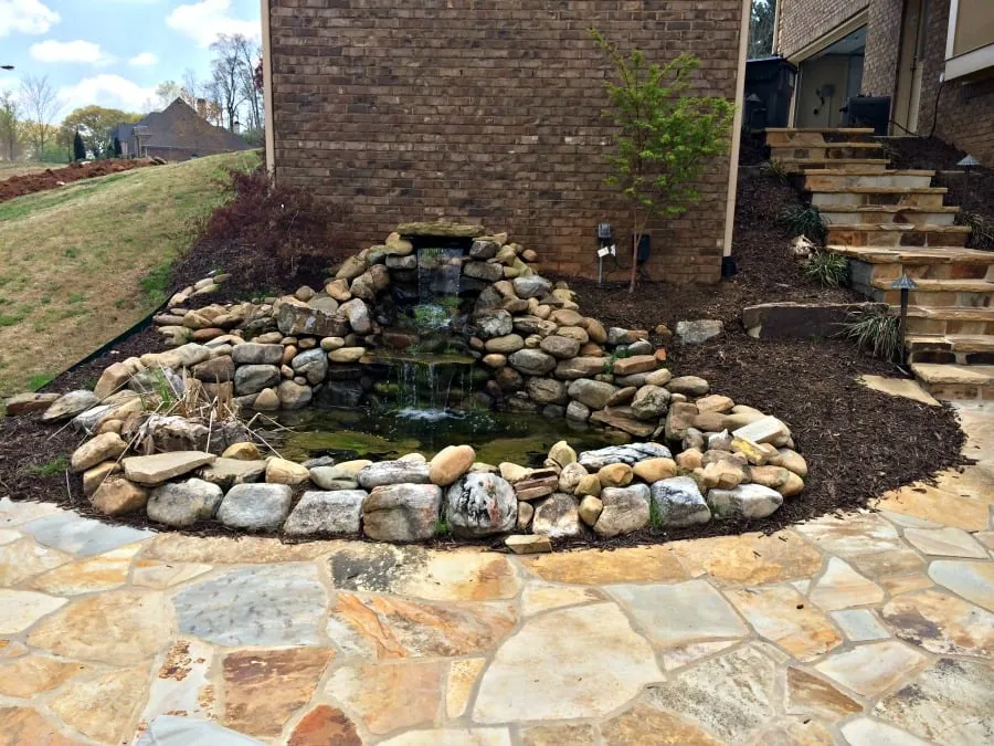 Local landscaping services with custom design in Woodstock, GA by All American Landscape and Stone