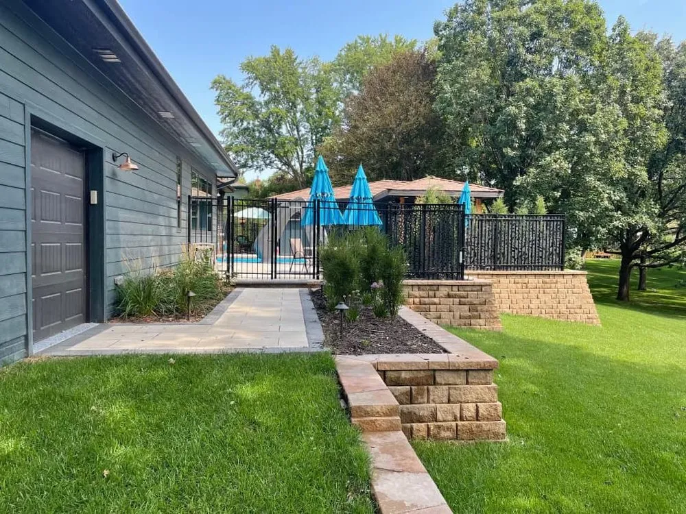 Affordable lawn care service with custom design in Omaha, NE by All American Landscape Design