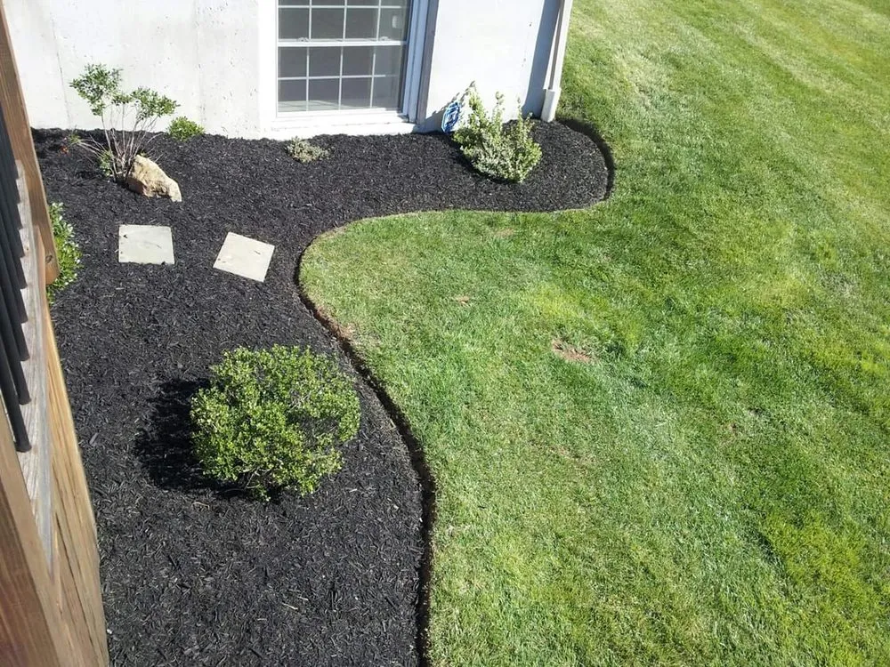 Custom landscape installation for year-round maintenance in Oley, PA by All American Lawn & Garden